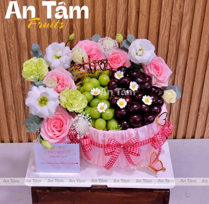 BÁNH KEM TRÁI CÂY PHỐI HOA TONE HỒNG VÀ NHO MẪU ĐƠN KÈM CHERRY MỸ 