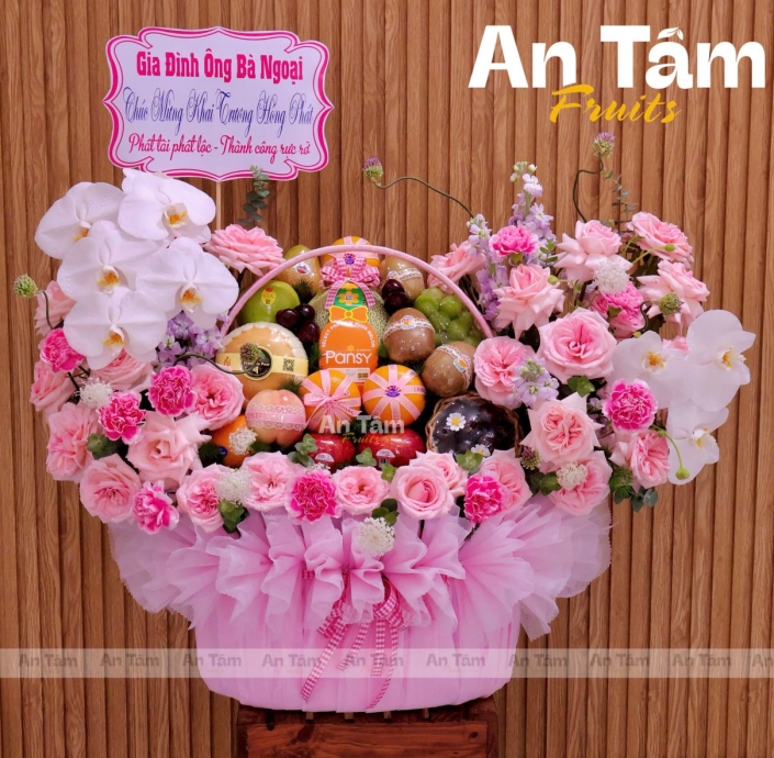 GIỎ TRÁI CÂY TONE HỒNG PHỐI HOA CHÚC MỪNG KHAI TRƯƠNG 