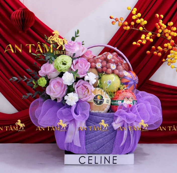 GIỎ TRÁI CÂY PHỐI HOA TONE TÍM CHIA BUỒN